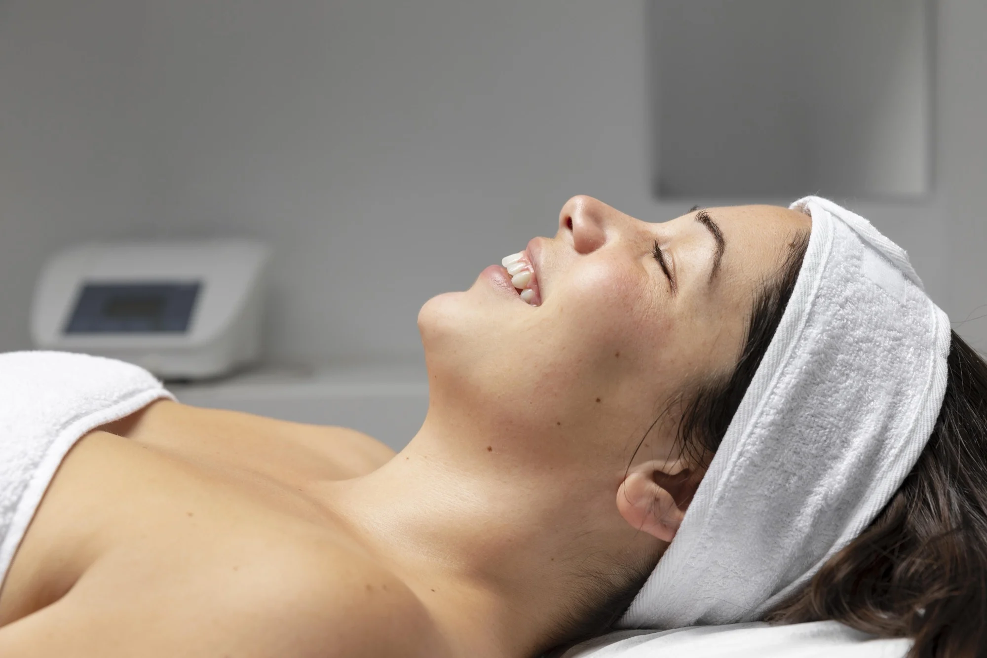 Home 1 Client enjoying a facial skincare treatment at Harry Morley Skin Clinic